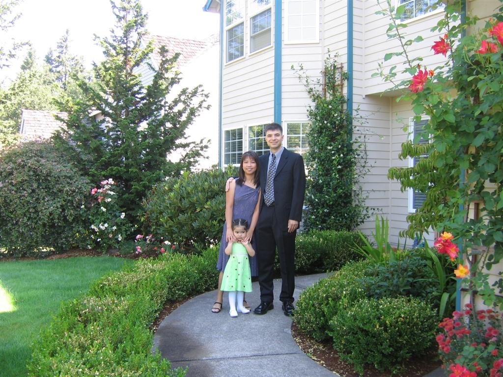 familyposeinfrontofthehouse.jpg