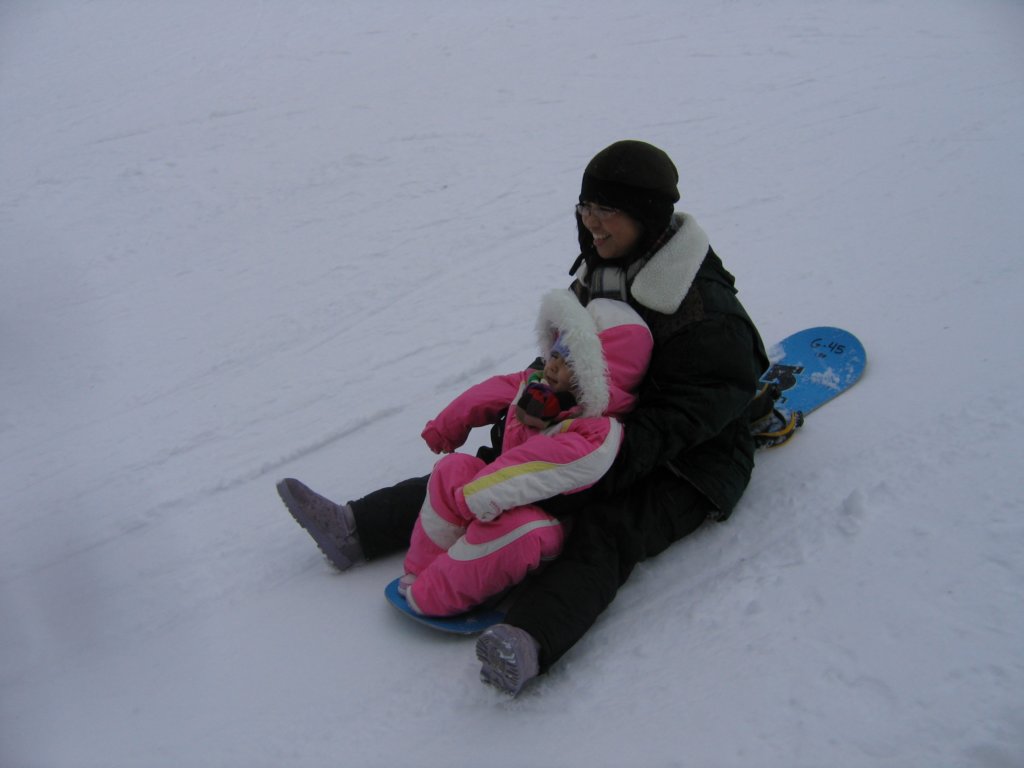 sleddingonasnowboard.jpg