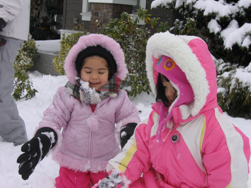allyandlorenplayinthesnow.jpg