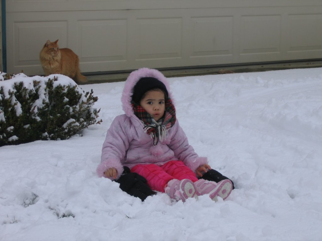 allysitsinthesnowandtobyexplores.jpg