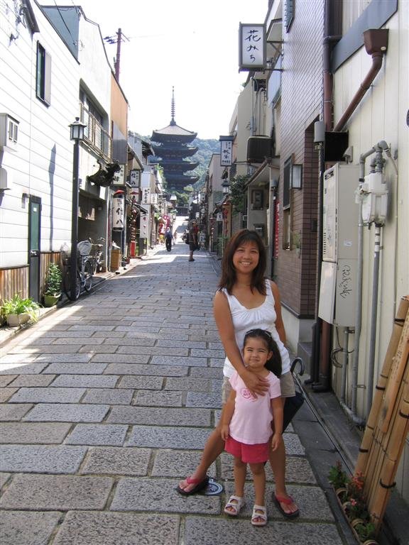 allyandmominfrontofthetempletheareaaroundthetempleisfullofolderbuildingsthatkeepwiththearchitecturalstyleofthetemple.jpg