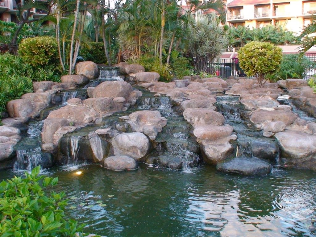 anicelyconstructedwaterfallinthecondogrounds.jpg