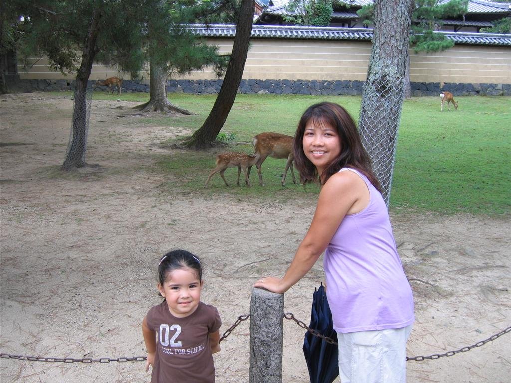 momandallyposeinfrontofanursingbabydeer.jpg